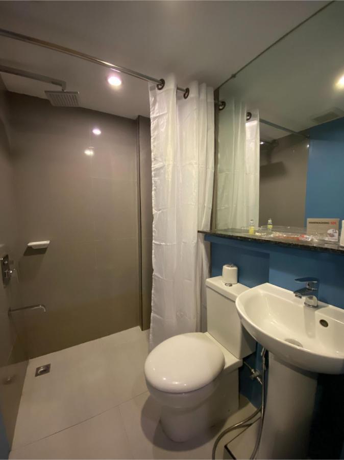 Capital O 820 Guijo Suites Makati Manila Exterior foto
